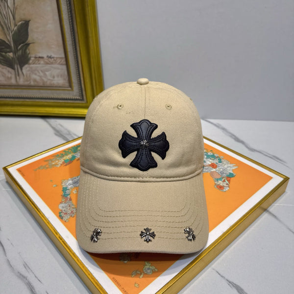 A cream-colored baseball cap by Chrome Hearts.