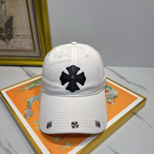 A white washed and distressed baseball cap from Chrome Hearts.