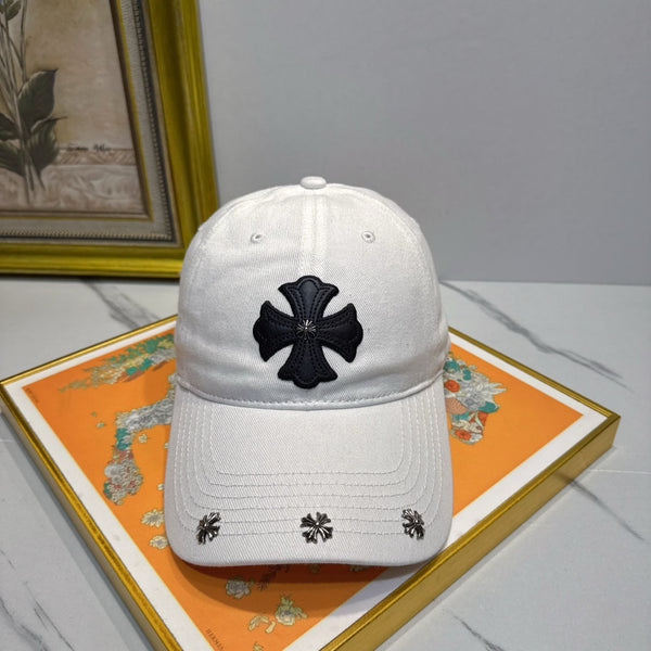 A white washed and distressed baseball cap from Chrome Hearts.