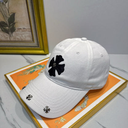 A white washed and distressed baseball cap from Chrome Hearts.