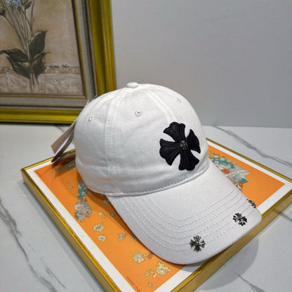A white washed and distressed baseball cap from Chrome Hearts.