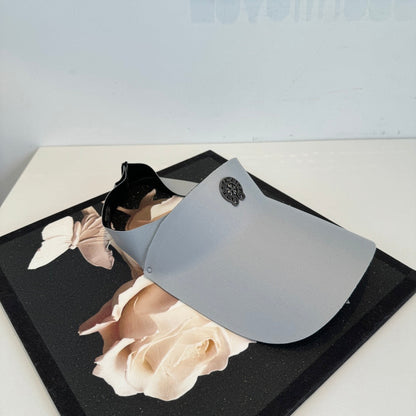 A Chrome Hearts open-top sun visor.