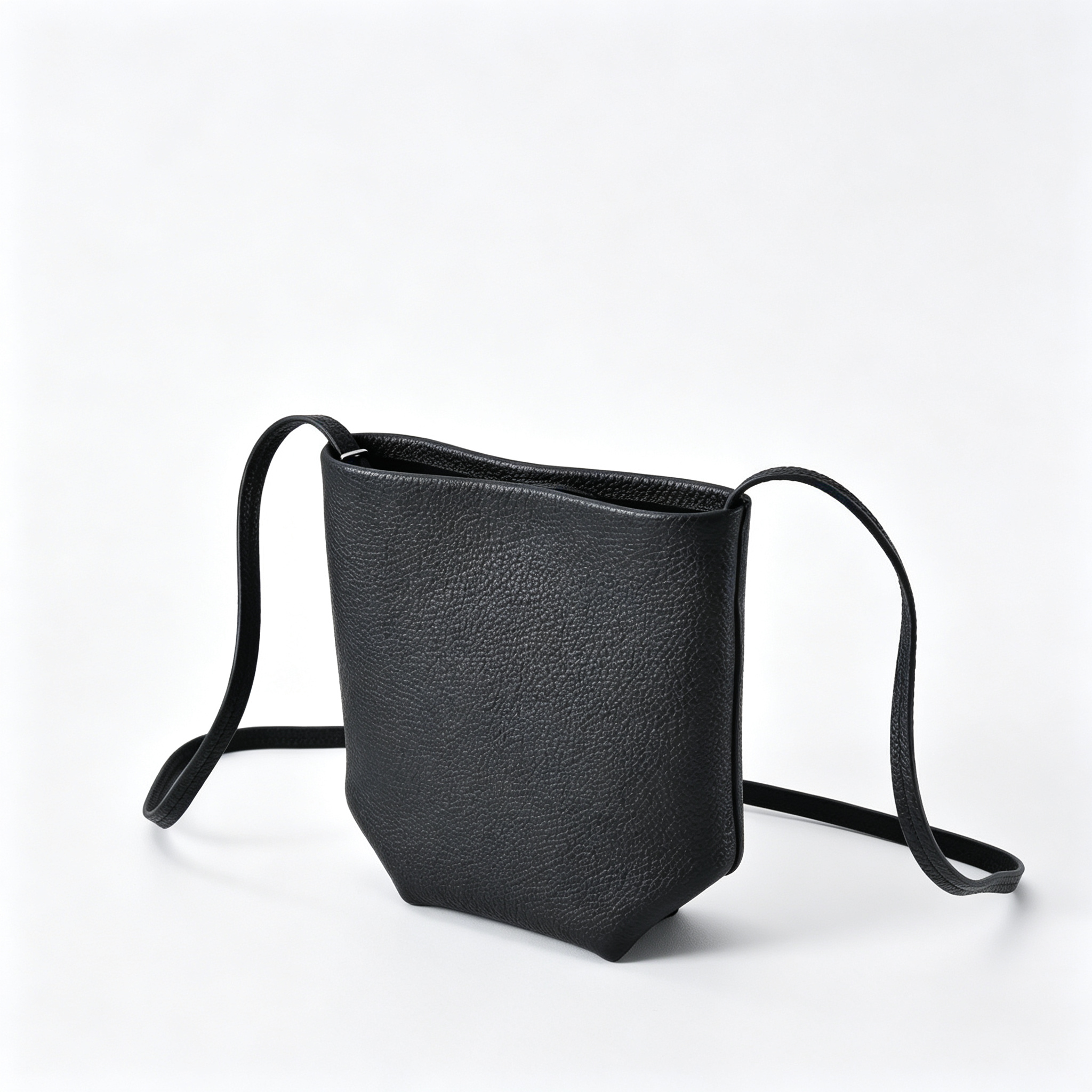 The Row N/S Park Mini Bucket Bag – Minimalist Leather Crossbody with Adjustable Strap,