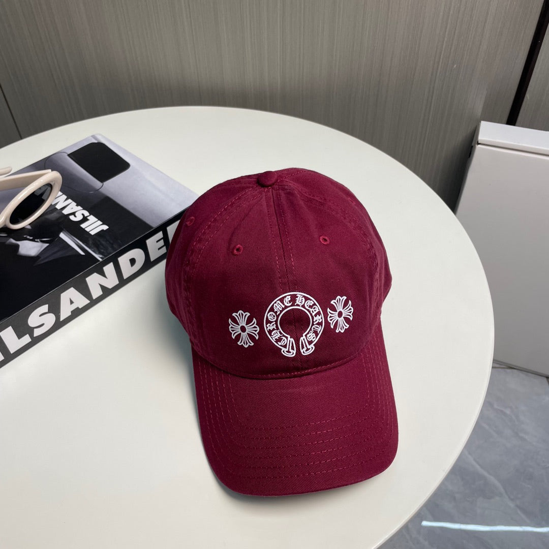A burgundy baseball cap from Chrome Hearts.