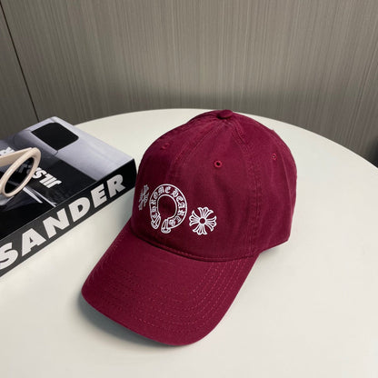 A burgundy baseball cap from Chrome Hearts.