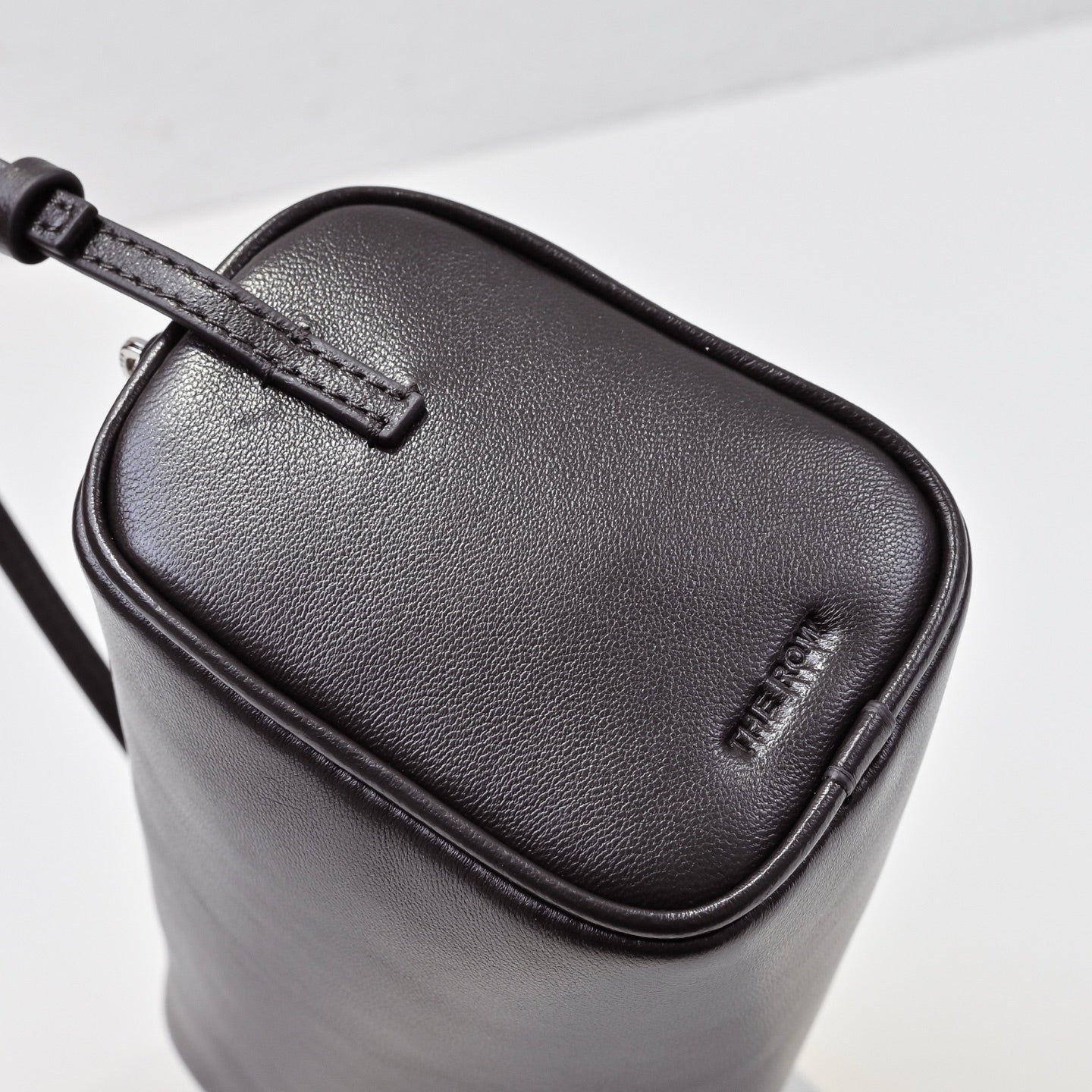 The Row Edith Barrel Bag | Small Grained Calf Leather Cylinder Bag | Black Shoulder Bag