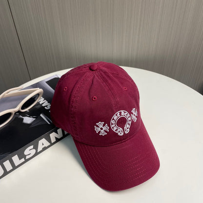 A burgundy baseball cap from Chrome Hearts.