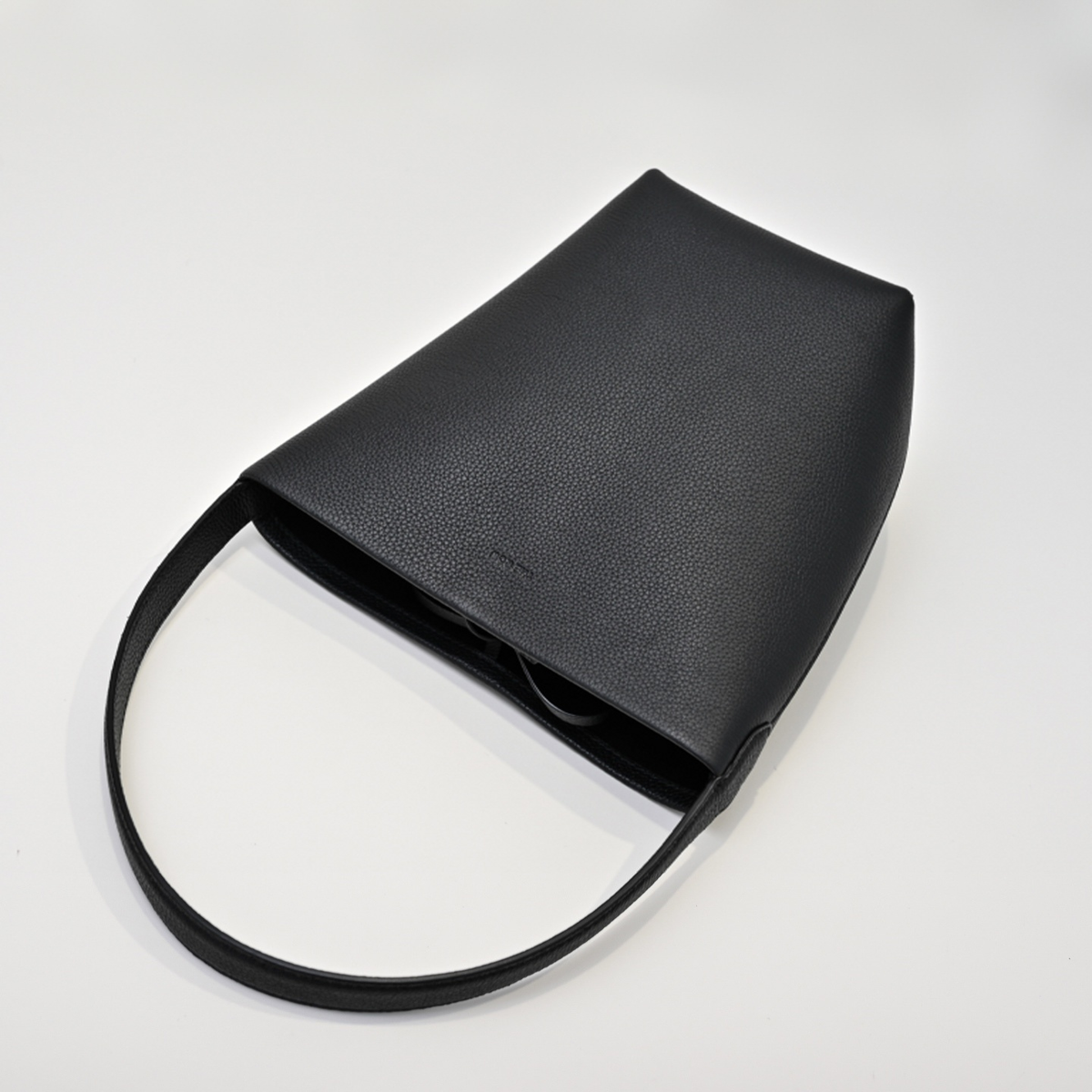 The Row N/S Park Small Tote Bag | 20cm Pebbled Calfskin Bucket Bag | Black Leather Shoulder Tote